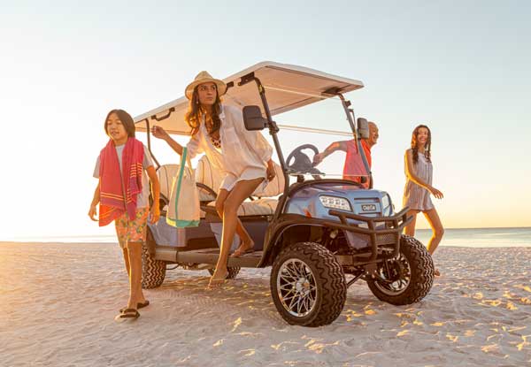 Onward 6 passenger custom golf cart at the beach